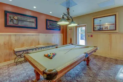 a large room with a pool table in it at 1 Bedroom Plus Murphy Mountain Condo In River Run Village With Mountain Views And Walking Distance To Ski Slopes in Keystone