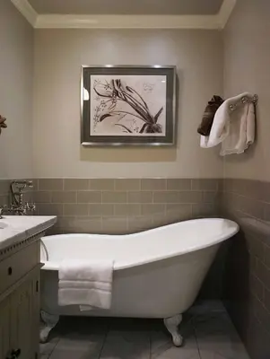 a bathroom with a white bath tub and a sink at Edwards House in Fort Collins