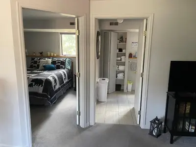 a bedroom with a bed and a window at On the Divide in Bailey