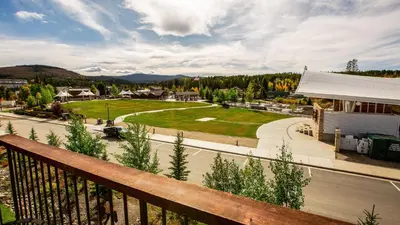 a view from a balcony of a town with a street at Trailhead Lodge 734 Condo in Winter Park