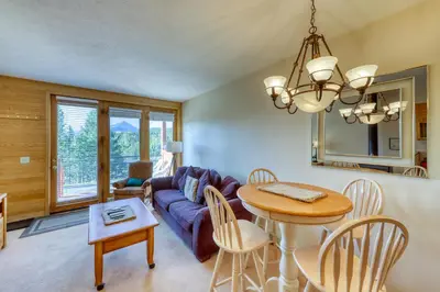 a living room with a couch and a table at Timber Ridge 504B in Silverthorne