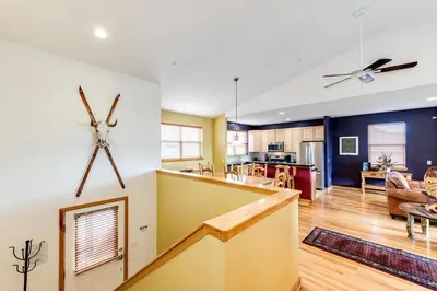 a kitchen and living room with a ceiling fan at 97A Exceptional Views, 4 BR, Central Location in Silverthorne