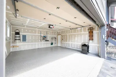 an empty room with a large room with white walls at 97A Exceptional Views, 4 BR, Central Location in Silverthorne