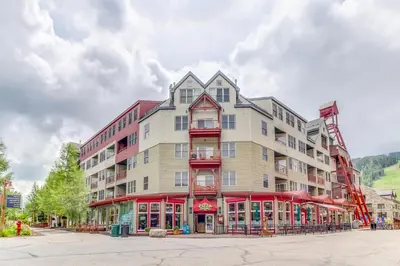 a large apartment building with a red trim at Gateway 5079 in Keystone