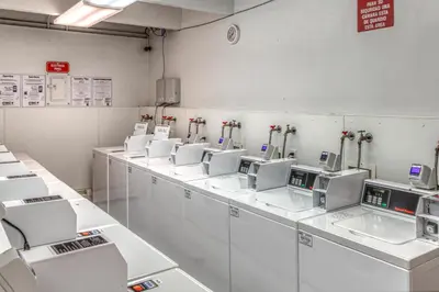 a laboratory with a row of machines in a room at Straight Creek Sanctuary in Dillon