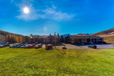 an aerial view of a building with a parking lot at Straight Creek Sanctuary in Dillon