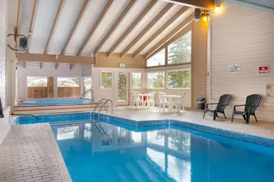 a swimming pool in a house with a ceiling at Bb103 Buffalo Village 2Br 2Ba Condo in Silverthorne