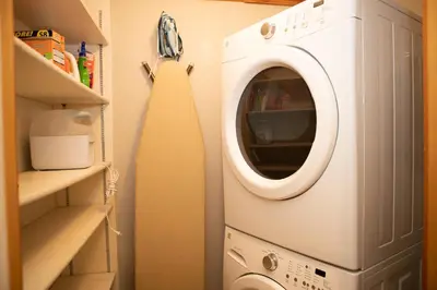 a washer and dryer in a laundry room at 1320 Tennis Townhome Townhouse in Keystone