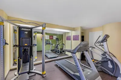 a gym with two treadmills and two ellipticals at Sleep Inn Denver Tech Center in Greenwood Village