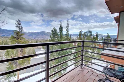 a balcony with a view of the mountains at Dd402E Buffalo Village Studio Condo in Silverthorne