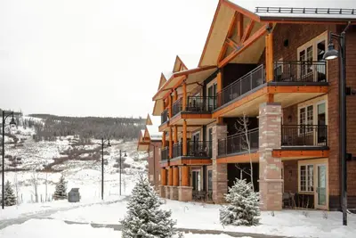a large building with snow on the ground at Hyatt Vacation Club at The Ranahan in Breckenridge