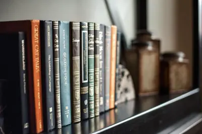 a row of books sitting on a shelf at Hyatt Vacation Club at The Ranahan in Breckenridge