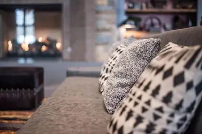a couch with two pillows on top of it at Hyatt Vacation Club at The Ranahan in Breckenridge
