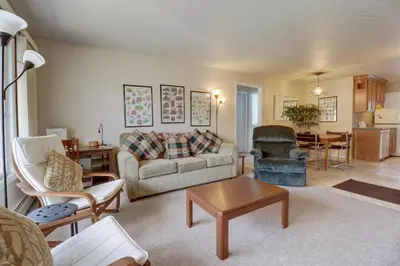 a living room with a couch and chairs and a table at CC42 Chateau Claire condo in Dillon