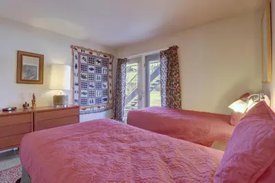 a bedroom with two beds and a window at CC19 Chateau Claire condo in Dillon