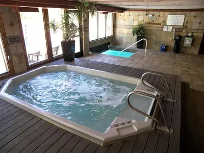 a large jacuzzi tub in a building with at Edgewater Studio 1 Bath EWJP in Keystone