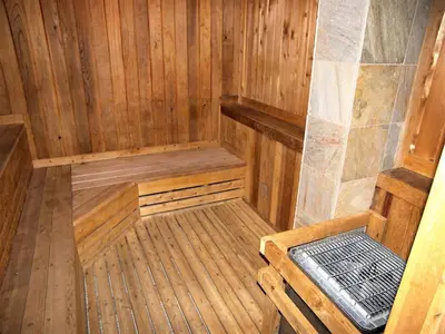 an empty wooden sauna with a bench in it at Edgewater Studio 1 Bath EWJP in Keystone