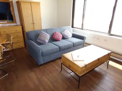 a living room with a couch and a coffee table at Edgewater Studio 1 Bath EWJP in Keystone