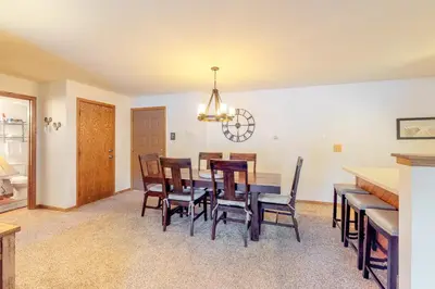 a dining room with a table and chairs at Buffalo Village in Silverthorne