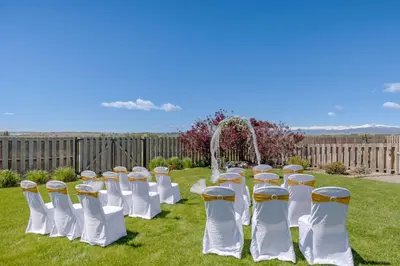 a row of chairs lined up in a field at Best Western Plus Loveland Inn in Loveland