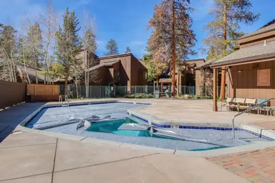 a swimming pool in a yard with a house at Wild Irishman 1080 in Dillon
