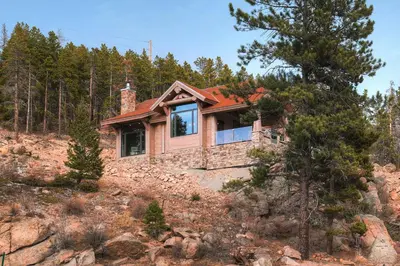 a house on the side of a mountain at SkyRun Cabin cabin in Golden