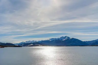 a large body of water with mountains in the background at 615 Oro Grande in Dillon