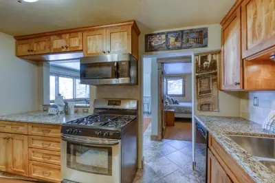 a kitchen with a stainless steel stove top oven at 615 Oro Grande in Dillon
