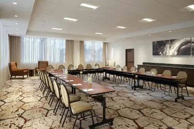a conference room with a long table and chairs at Sheraton Denver West Hotel in Lakewood