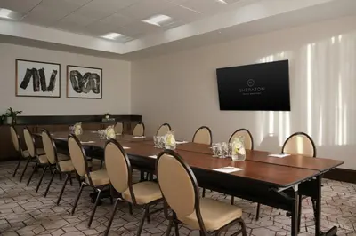 a large conference room with a long table and chairs at Sheraton Denver West Hotel in Lakewood