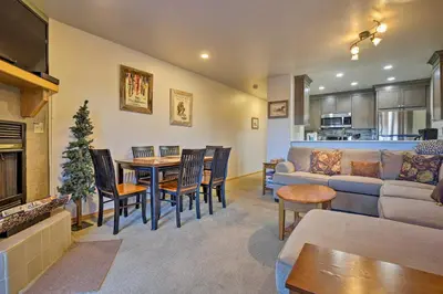 a living room with a couch and a table at Walk to Main Street Frisco Townhome with Decks in Frisco