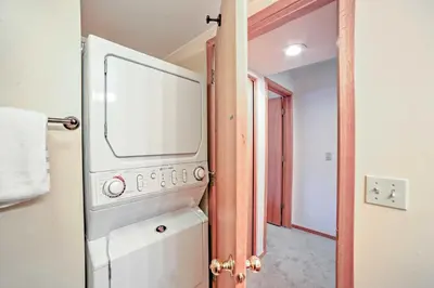a white washer and dryer in a room at Walk to Main Street Frisco Townhome with Decks in Frisco