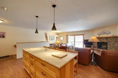 a kitchen and living room with a couch and a table at 1 Mi to Main Street Mtn-View Home in Frisco in Frisco