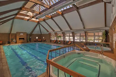 a large indoor swimming pool with a roof at 1 Mi to Main Street Mtn-View Home in Frisco in Frisco