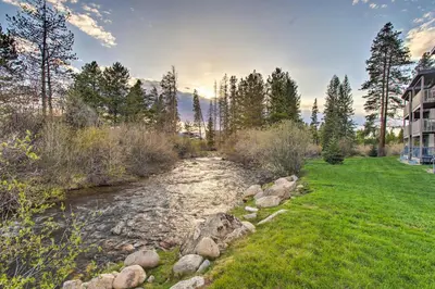a stream in a yard next to a house at Winter Park Condo on Bus Route, 2 Blocks to Dtwn! in Winter Park