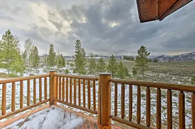 a winter view from the deck of a cabin at 2 Mi to Skiing Mtn-View Home with Deck in Granby! in Granby