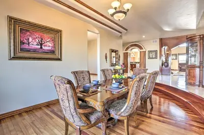 a dining room with a table and chairs at 10 Mi to Barr Lake State Park Home with Mtn Views in Hudson