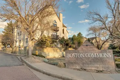 a building with a sign that says boston commons at Englewood Apt with Patio in Denver Tech Center in Englewood