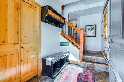a room with a staircase and a stair case at Dtwn Frisco Home with Mtn View, 11 Mi to Ski Breck! in Frisco