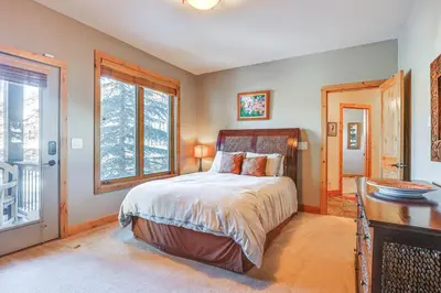 a bedroom with a bed and a desk and a window at Dtwn Frisco Home with Mtn View, 11 Mi to Ski Breck! in Frisco