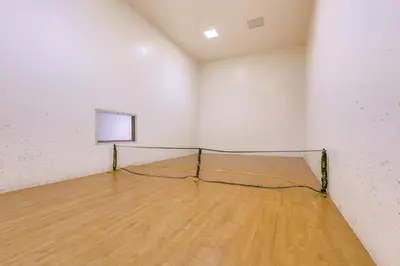 an empty room with a basketball net in the middle at The Inn at Silver Creek Resort Retreat with Balcony! in Granby