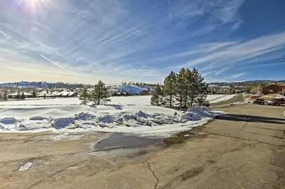 a pile of snow on a parking lot at Near Lake Granby Grand Lake Townhome with Views in Grand Lake