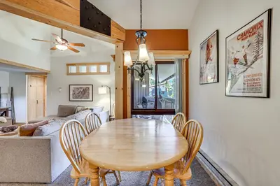 a dining room with a wooden table and chairs at Ski Shuttle and Mountain Views Keystone Resort Home in Keystone