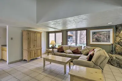 a living room with a couch and a table at Ski Shuttle and Mountain Views Keystone Resort Home in Keystone
