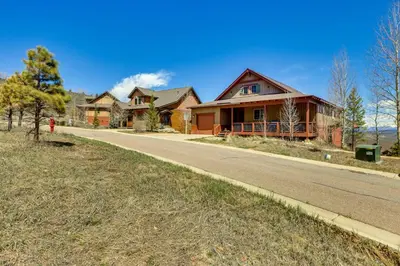 a house on the side of a road at 1 Mi to Granby Ranch Mtn Home with Deck in Granby