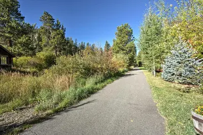 a dirt road with trees on the side of it at 11 Mi to Slopes Frisco Home with Hot Tub and Sauna! in Frisco