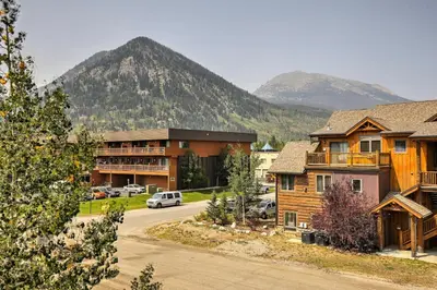 a view of a lodge with a mountain in the background at Half-Mi to Copper Mtn Slopes Frisco Unit with Loft in Frisco