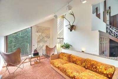 a living room with a couch and chairs at Boulder Barrett House on Mtn Peak with Hot Tub in Boulder