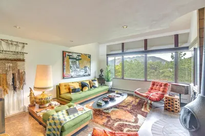 a living room filled with furniture and a large window at Boulder Barrett House on Mtn Peak with Hot Tub in Boulder