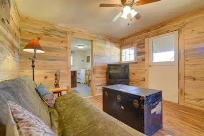 a living room with a couch with a trunk at Hiawatha Peaceful Living in Rocky Mtn Natl Park in Allenspark